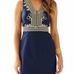 Elegant Navy Blue Dress with Gold Accents